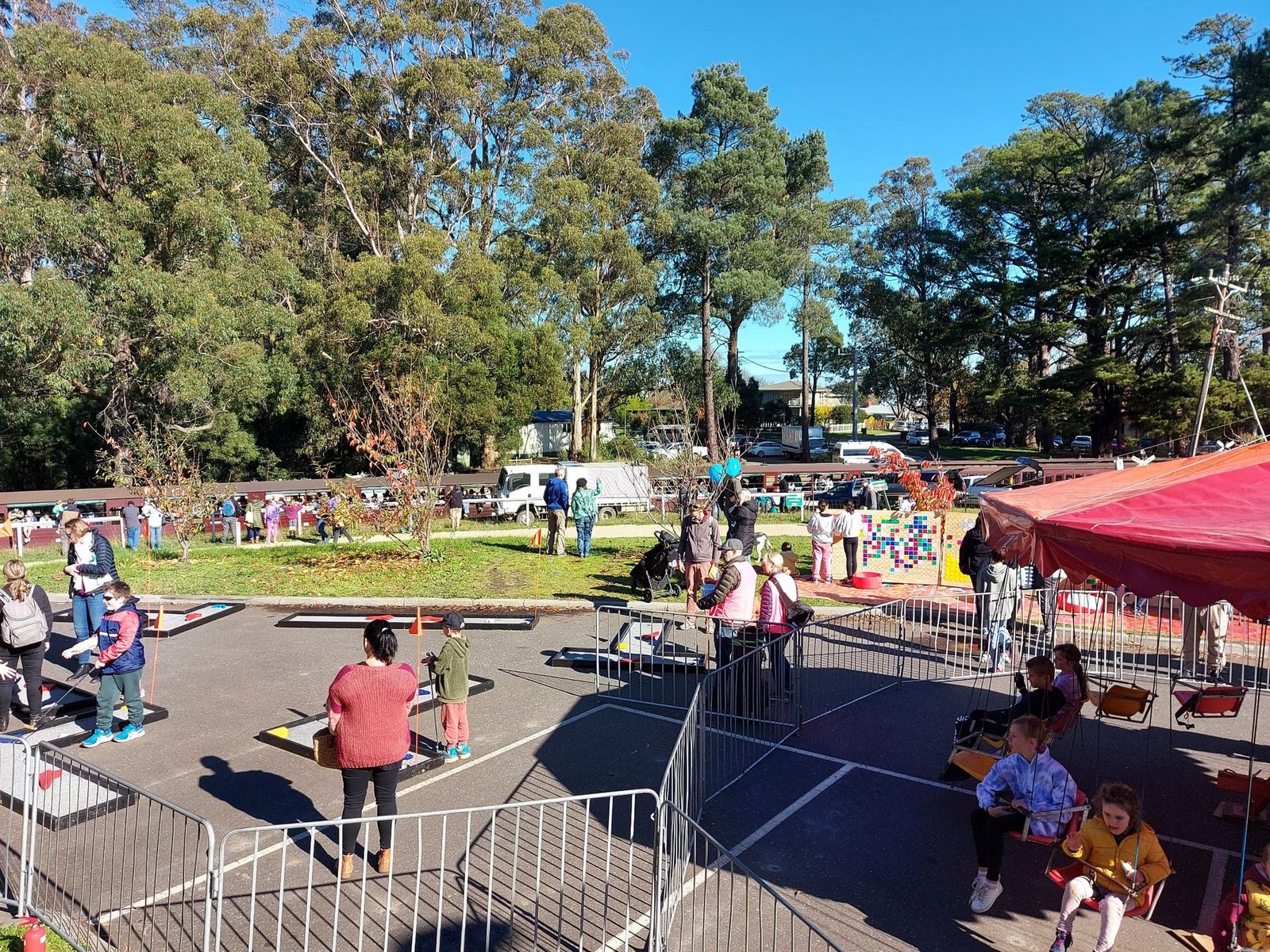 PAVED Festival rides, stalls and visitors around the festival grounds