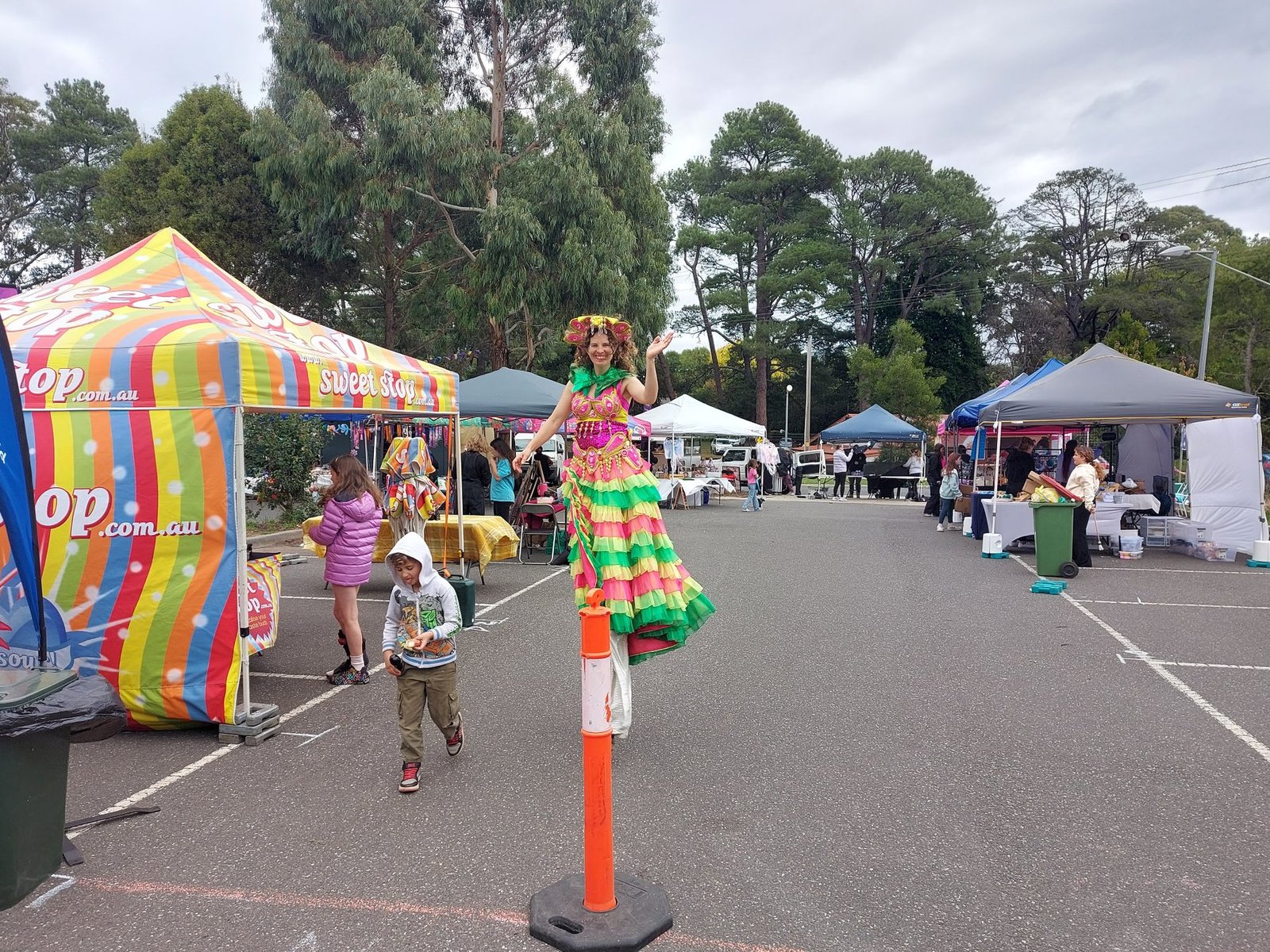 Colourful roaming performer at PAVED Festival